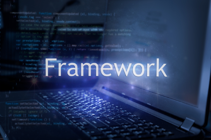 Framework inscription against laptop and code background.