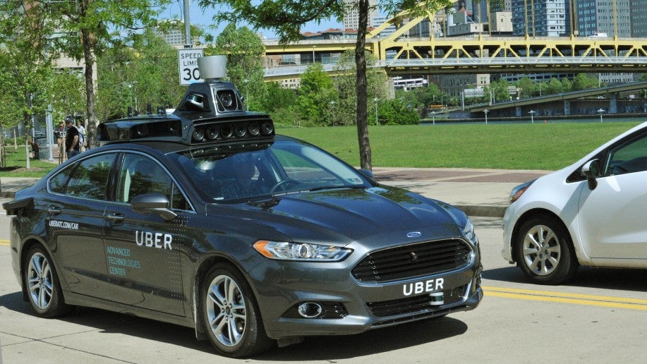 Uber kick starts own driverless car trials