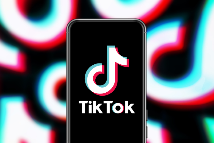 Smart phone with TIK TOK logo, which is a popular social network on the internet.