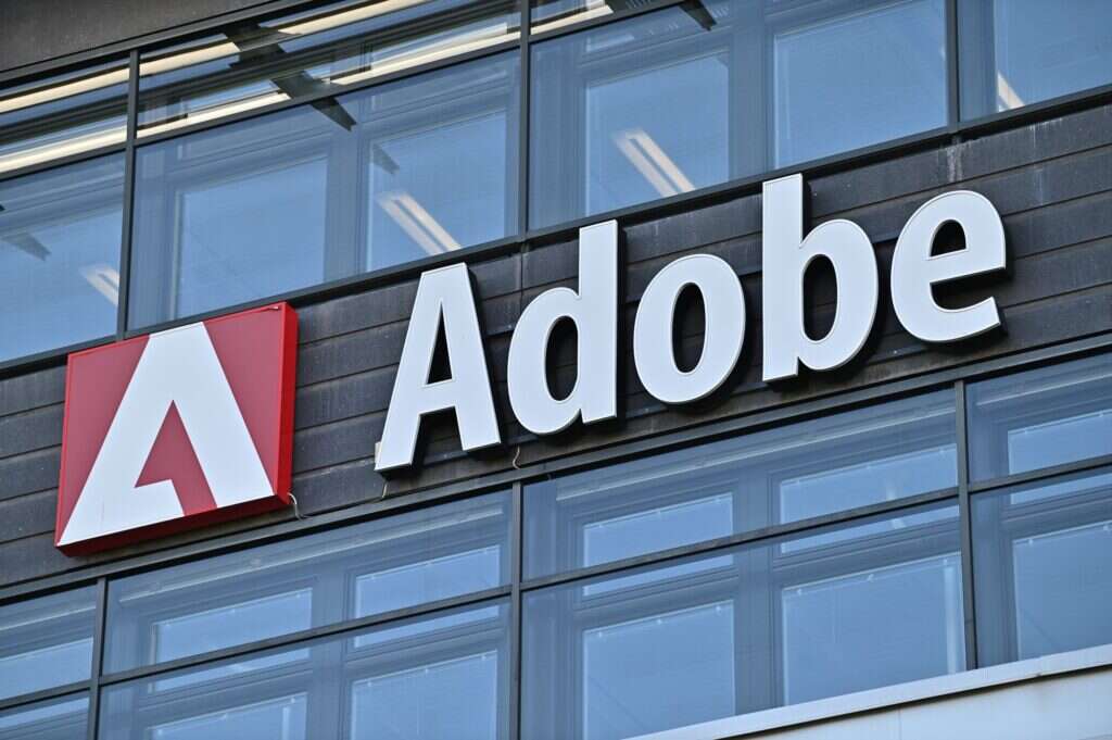 Exterior shot of the Adobe logo. Adobe is one of eight new signatories to the White House voluntary code. It commits them to watermarking AI content (Photo: Mats Wiklund / Shutterstock)