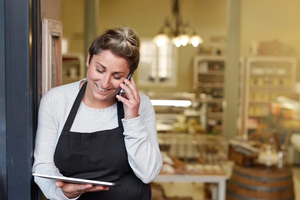 women in bakery businesses using tablet