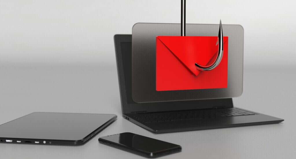 A rendering of a hook piercing a laptop screen and, in front of that, an email icon. The image is a metaphor for phishing.