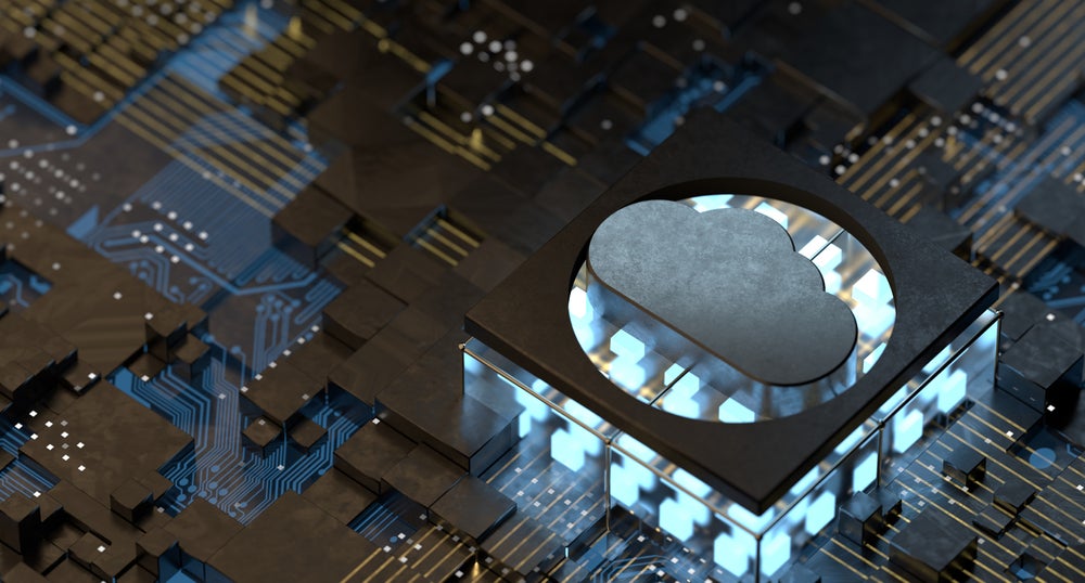 A cloud-shaped chip resting on other microchips, a visual metaphor for the hybrid cloud.