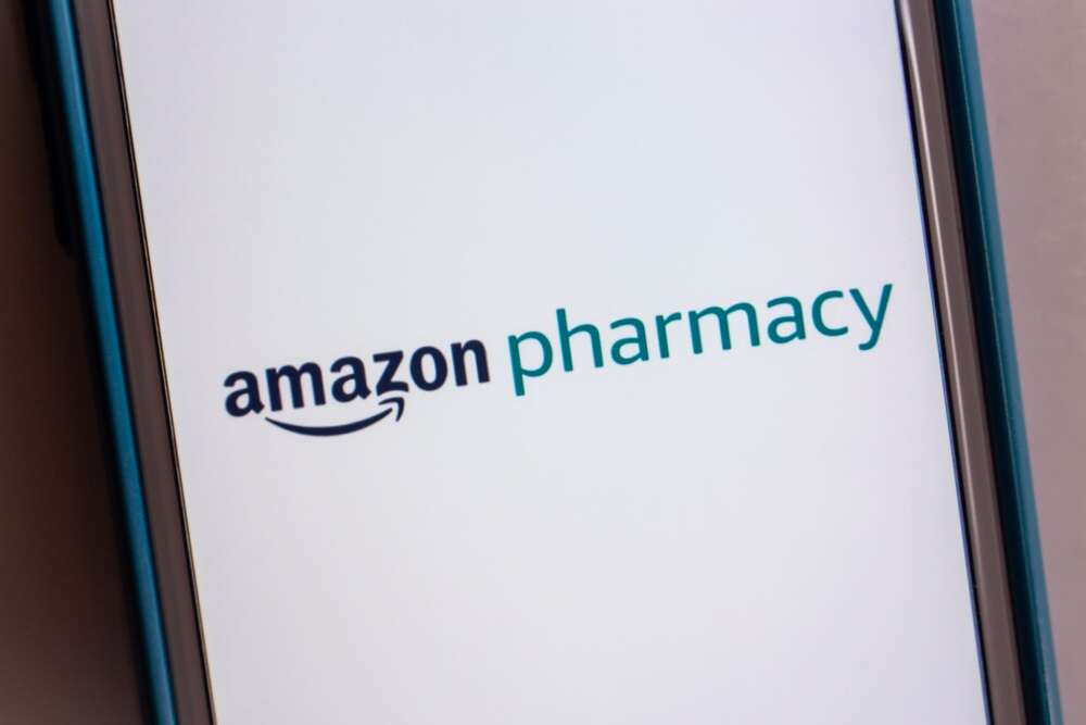 Image of the Amazon healthcare division Amazon Pharmacy logo on a mobile phone screen.