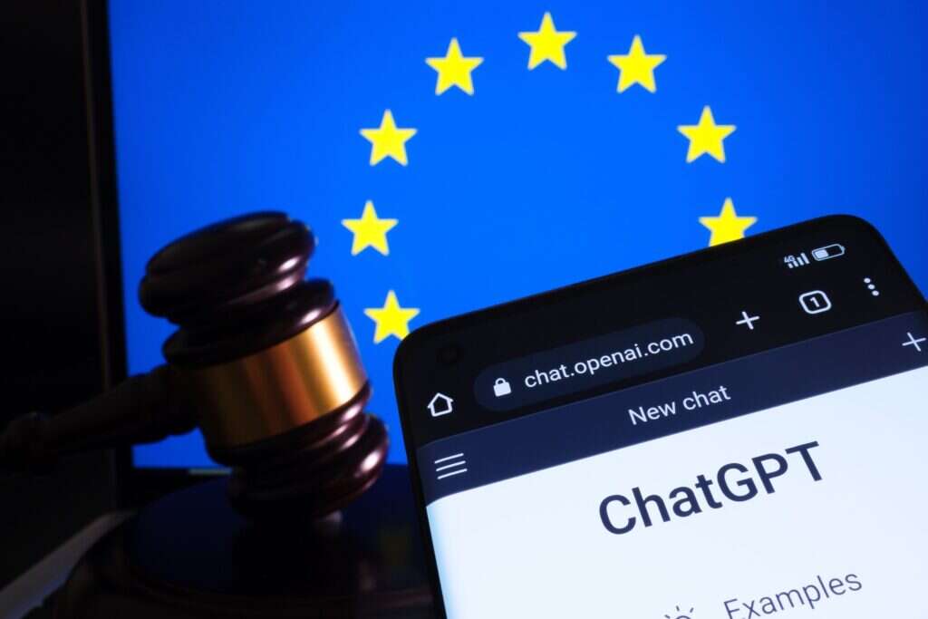 A phone screen shows ChatGPT and a European flag is in the background to show the EU AI Act