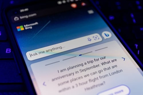 A photo of Microsoft's Bing AI chatbot working on a mobile phone, used to illustrate a story about its new phi-mini-3 compact LLM.