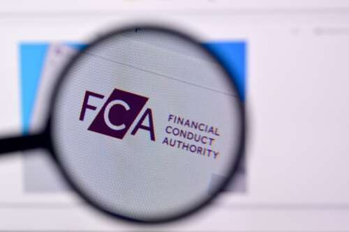 The FCA logo under a magnifying glass, a photo used to illustrate a story about the UK fintech scene.