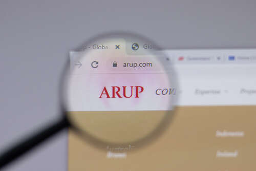 The logo of Arup on a website tab, shown underneath a magnifying glass.